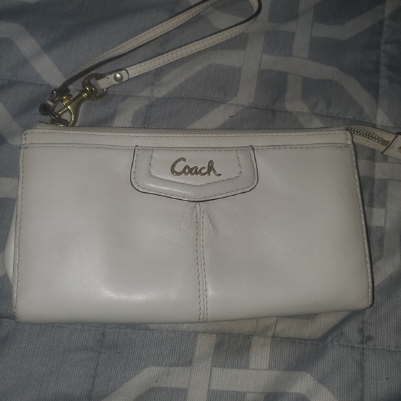 Coach Handbags - Coach- shimmer white wristlet